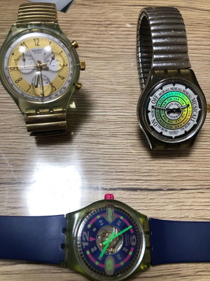 Three used Swatch watches