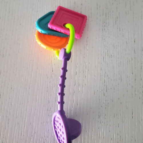 Fisher Price teething and chewing toy like new with multiple surfaces