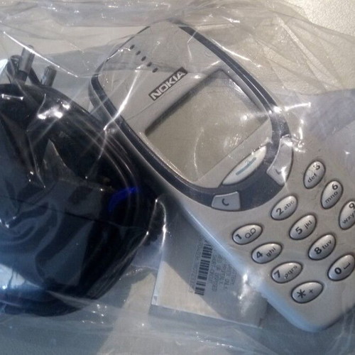 Nokia 3330 used, white with Greek menu, battery and charger