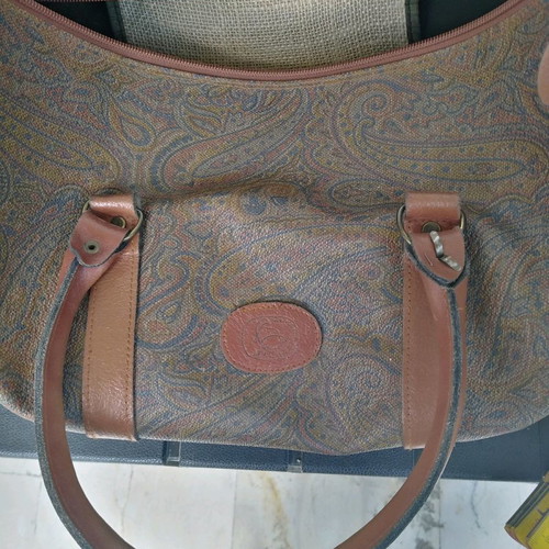 Brown travel sack used with leather details