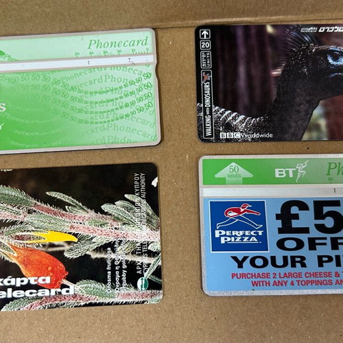 Phone cards used, pack of 4