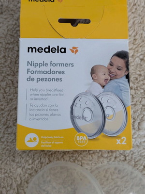 Medela nipple former like new, 1 piece with cover