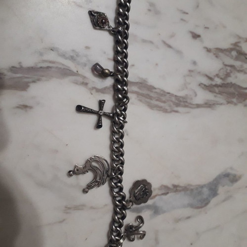 Vintage bracelet like new with silver hanging charms