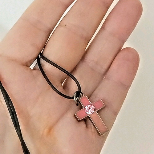 Pink cross used with crystal and adjustable cord