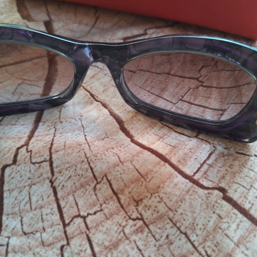 John Galliano sunglasses used, distinctive purple