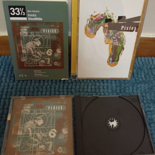 Pixies Doolittle book and live DVD like new, rock