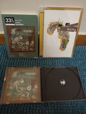 Pixies Doolittle book and live DVD like new, rock