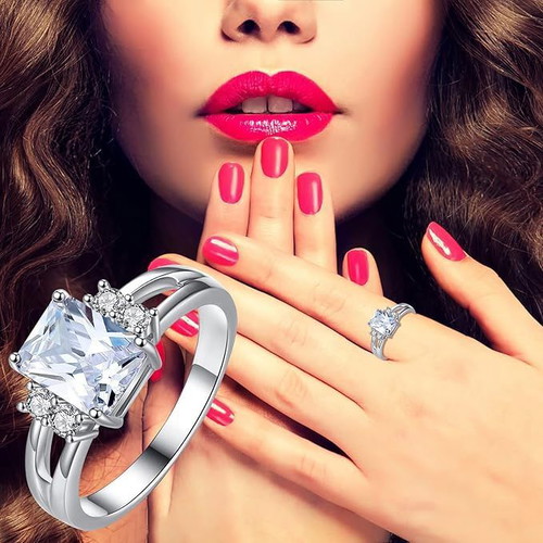 Ring with white zircon new, silver metal with rhodium plating