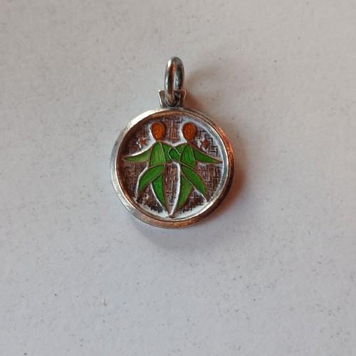 Silver Gemini zodiac pendant with enamel