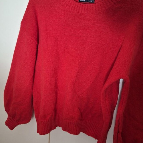Red knitted sweater used, size L
