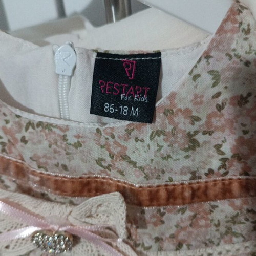 Baby coat and dress new for 18 months