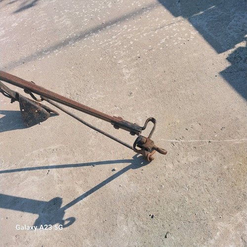 Plow used iron tool from 1940s for soil cultivation