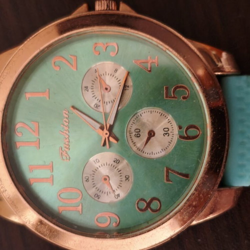 Fashion wristwatch green with rose gold like new