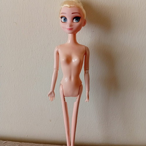 Elsa doll from Disney Frozen used, articulated arms