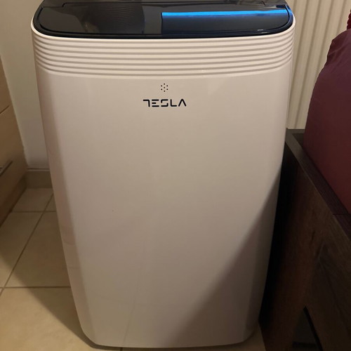 Tesla Portable Air Conditioner like new with cooling, heating, Wi-Fi
