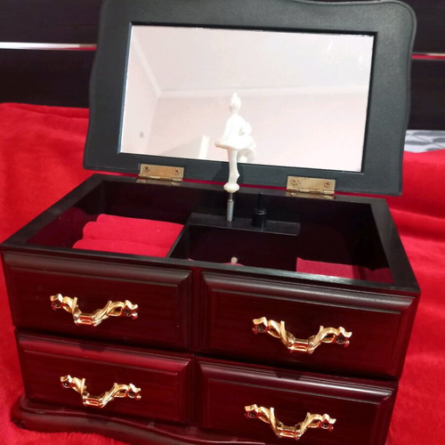 Vintage jewelry music box used with dancing ballerina