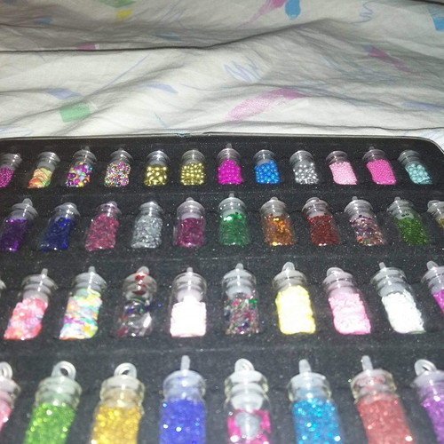 Set of 48 Glitter and Nail Art Flakes in Glass Bottles with Metal Case