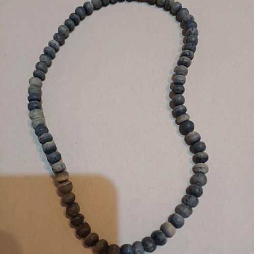 Necklace used with porous blue-gray stones from Thailand