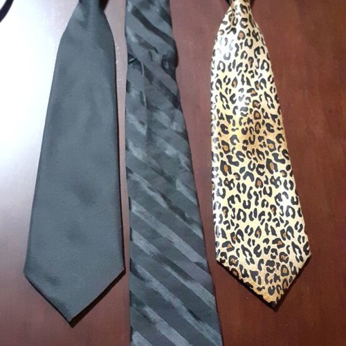 Three women's ties like new, two black and one tiger print