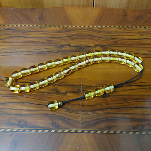 Komboloi made of high-quality resin, new, 33+4 beads amber color