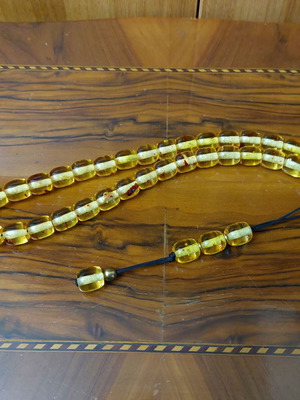 Komboloi made of high-quality resin, new, 33+4 beads amber color