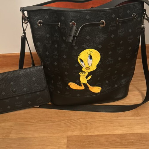 MCM collectible black crossbody bag like new with detachable pouch