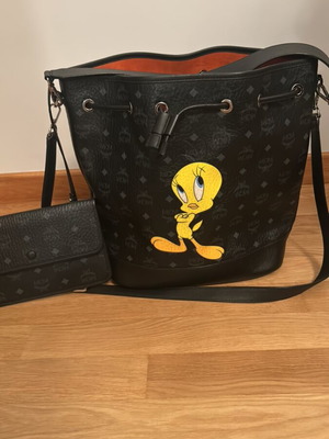 MCM collectible black crossbody bag like new with detachable pouch