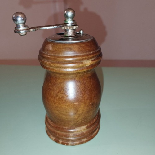 Vintage wooden spice grinder used