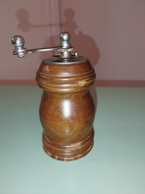 Vintage wooden spice grinder used