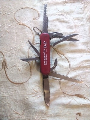 Multitool pocket knife like new, stainless steel with saw and scissors