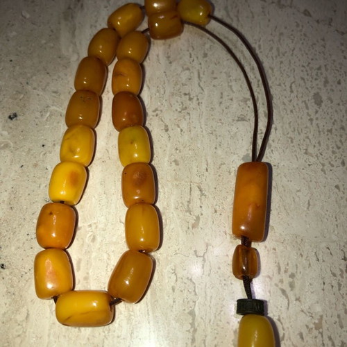 Worry beads used from royal amber with silver logo