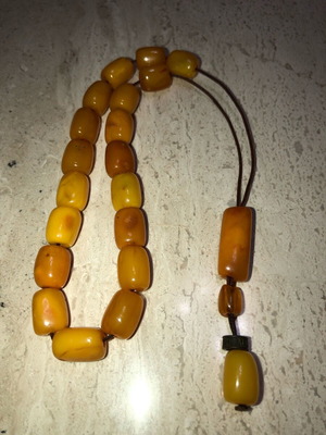 Worry beads used from royal amber with silver logo