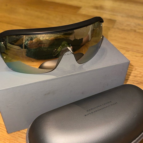 Sunglasses like new with extra box, case and cleaning cloth