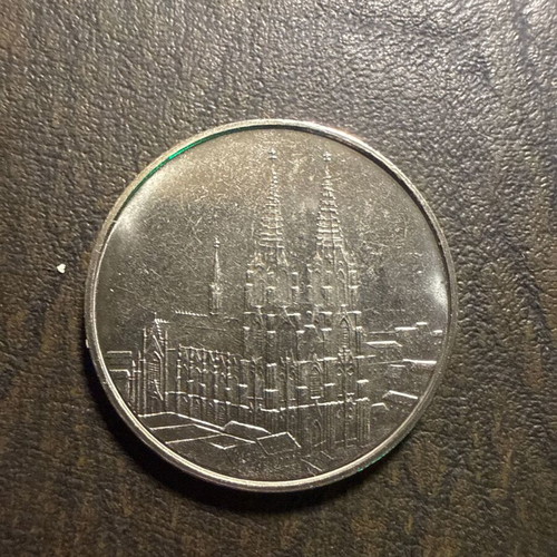 Collectible metal medal with embossed Gothic cathedral, new