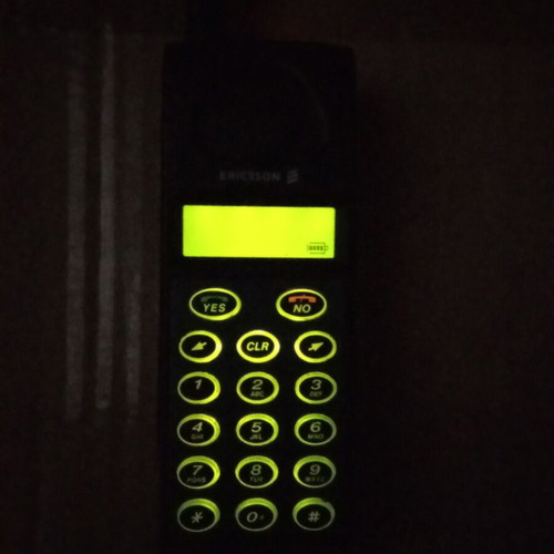 Ericsson GA 628 mobile phone used, vintage collectible with charger and cards