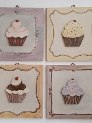 Set of four used decorative cupcake wall art pieces