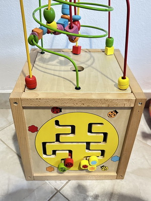 Wooden educational activity cube for children