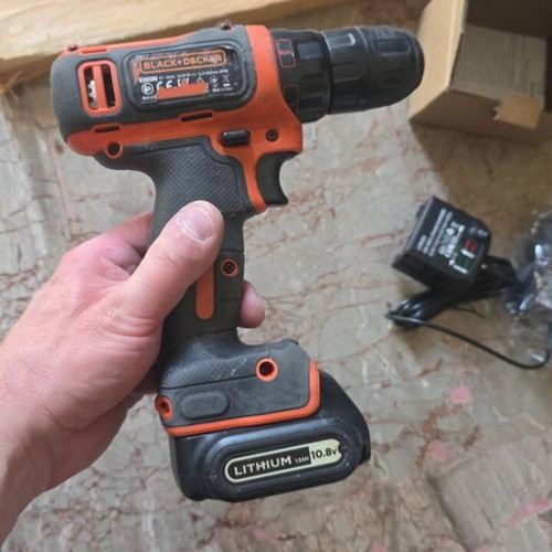 Black & Decker cordless drill used with 10.8V battery and charger