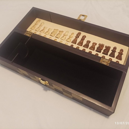 Wooden wine case used with travel chess set