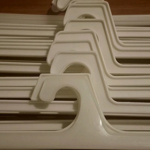 Small white hangers like new, pack of 15 pieces