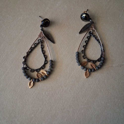 Earrings used black with gold accents