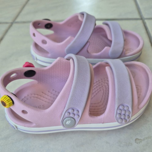 Crocs pink sandals with 3 charms, size C9