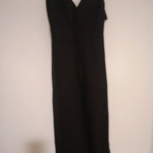 Black one-piece jumpsuit like new, deep neckline and back tie, size S