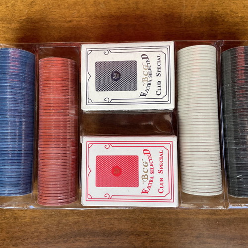 Poker set new with chips and playing cards in plastic case