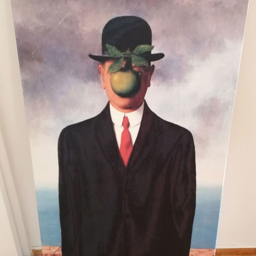 The Son of Man painting by Rene Magritte used, canvas print on wood frame