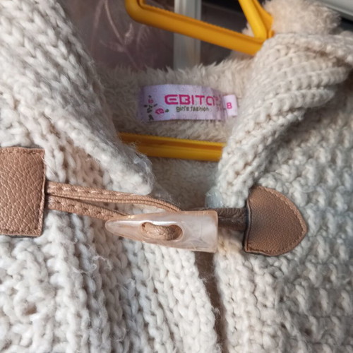 Coat size 8 used with minor wear on pocket