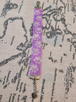 Beaded bracelet like new, purple and white