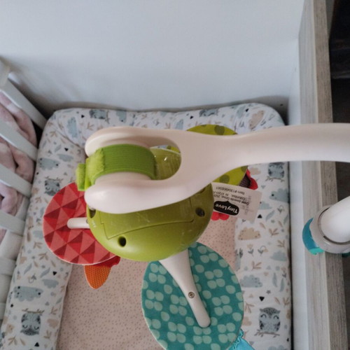 Tiny Love rotating toy used with music and colorful animals
