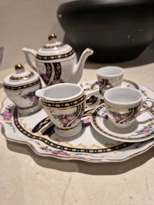 Handmade porcelain miniature set like new, decorative