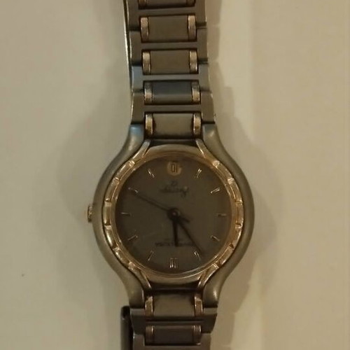 Favre Leuba women's watch titanium and gold like new